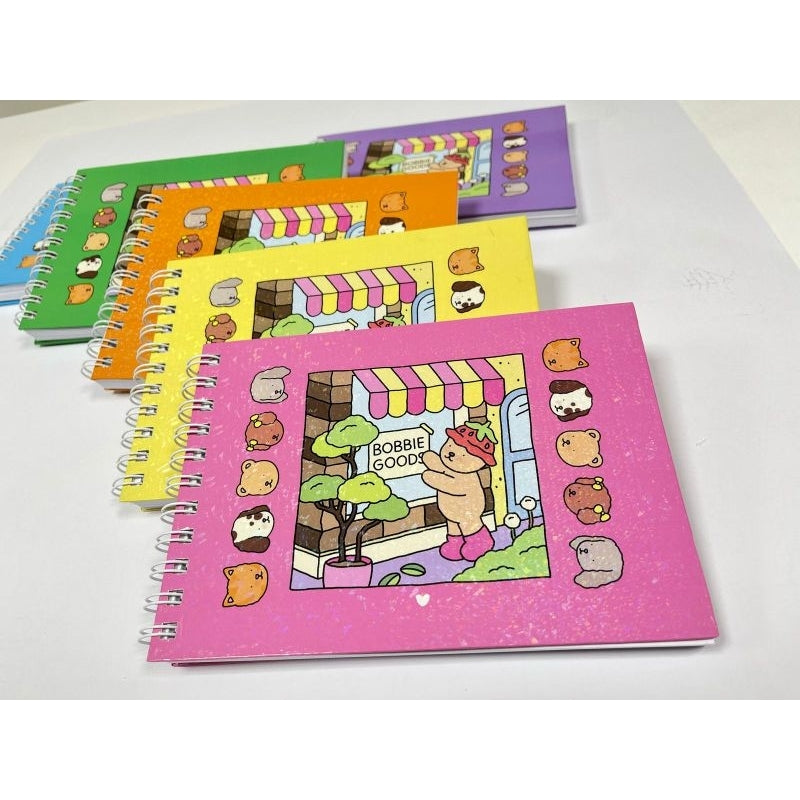 Livro de Colorir Bobbie Goods Roxo Capa Dura com Laminação